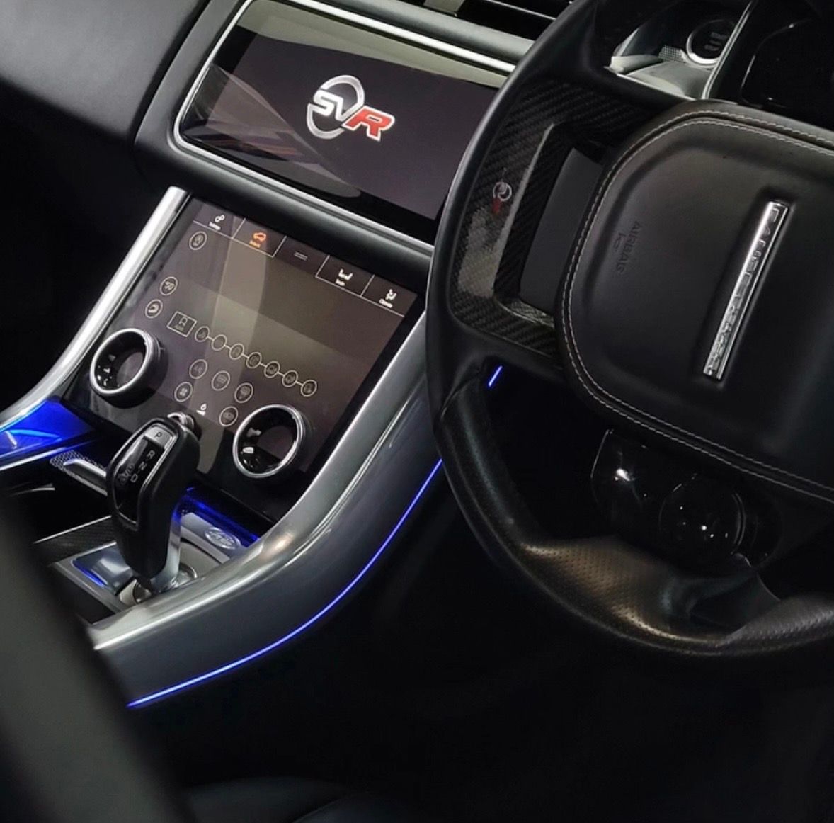 The carbon and leather interior of a Range Rover SVR